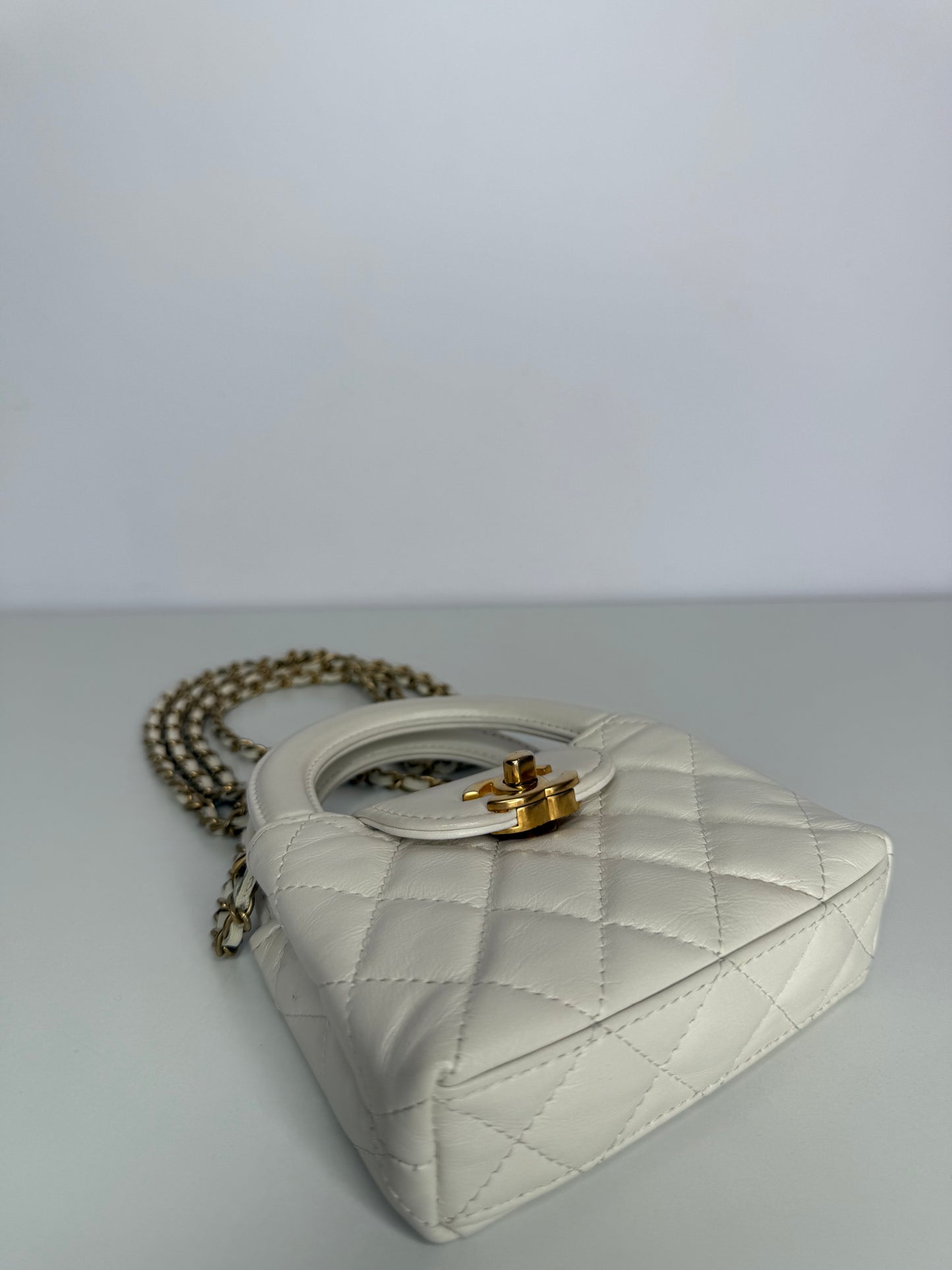 Chanel Micro Kelly White Shiny Aged Calfskin Brushed Gold Hardware