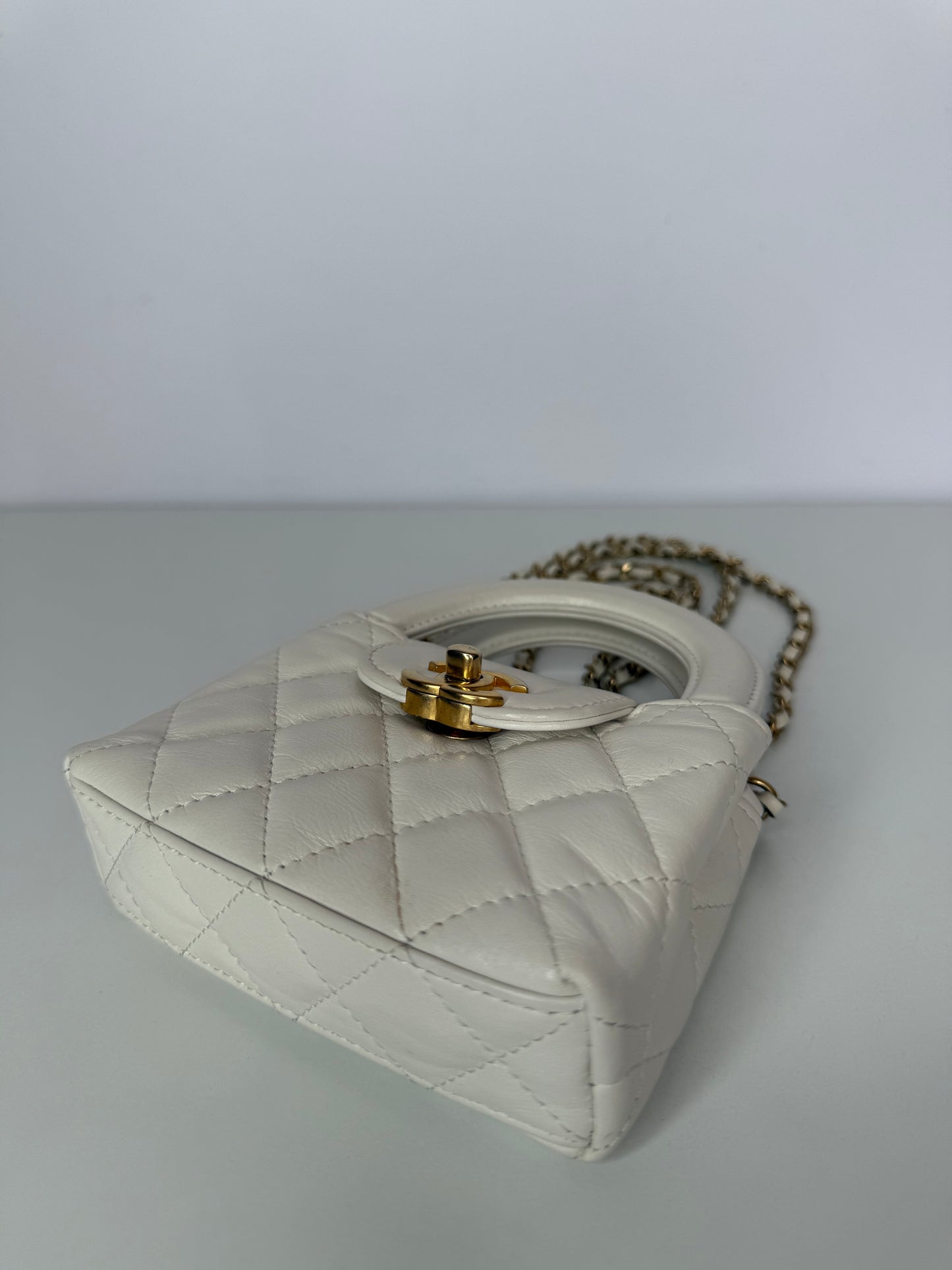 Chanel Micro Kelly White Shiny Aged Calfskin Brushed Gold Hardware