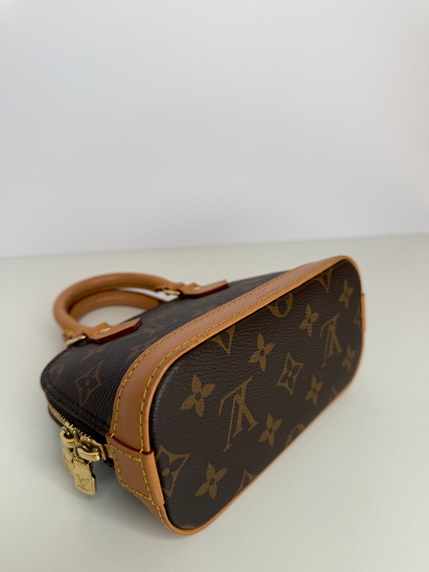 Louis Vuitton Nano Alma Monogram Canvas