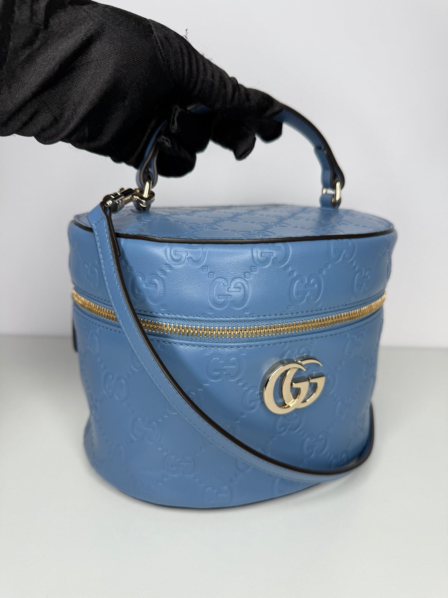 Gucci GG Embossed Beauty Case in Blue Leather