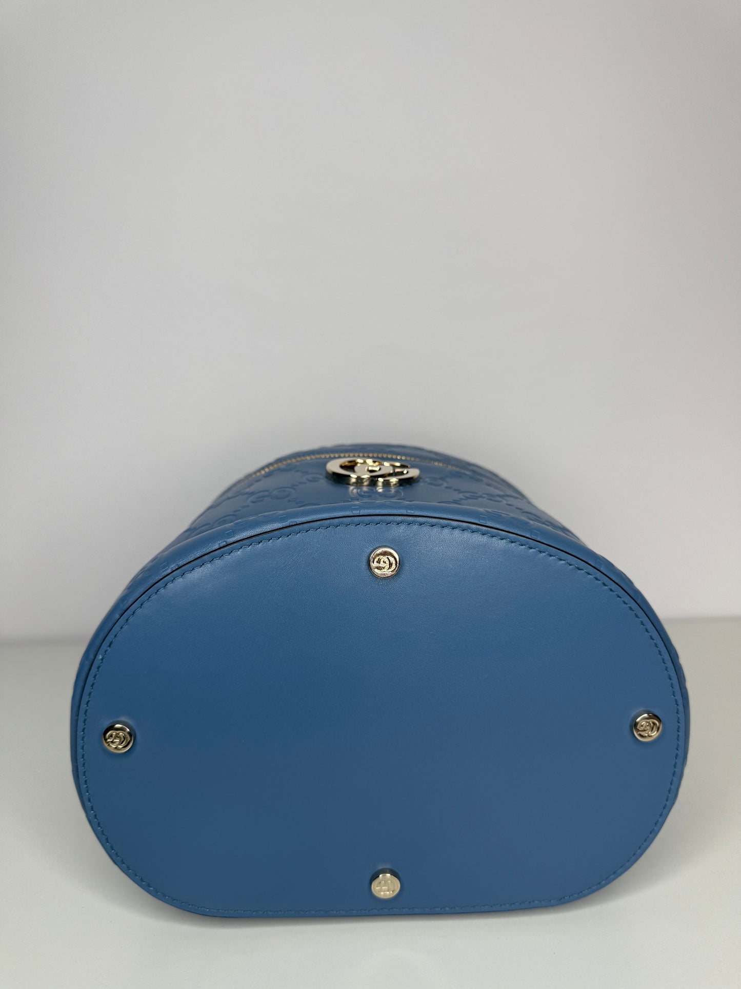 Gucci GG Embossed Beauty Case in Blue Leather