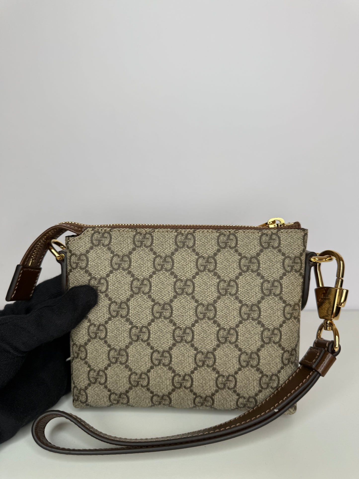 Gucci GG Coated Canvas Interlocking G Patch Wristlet Mini Messenger Bag