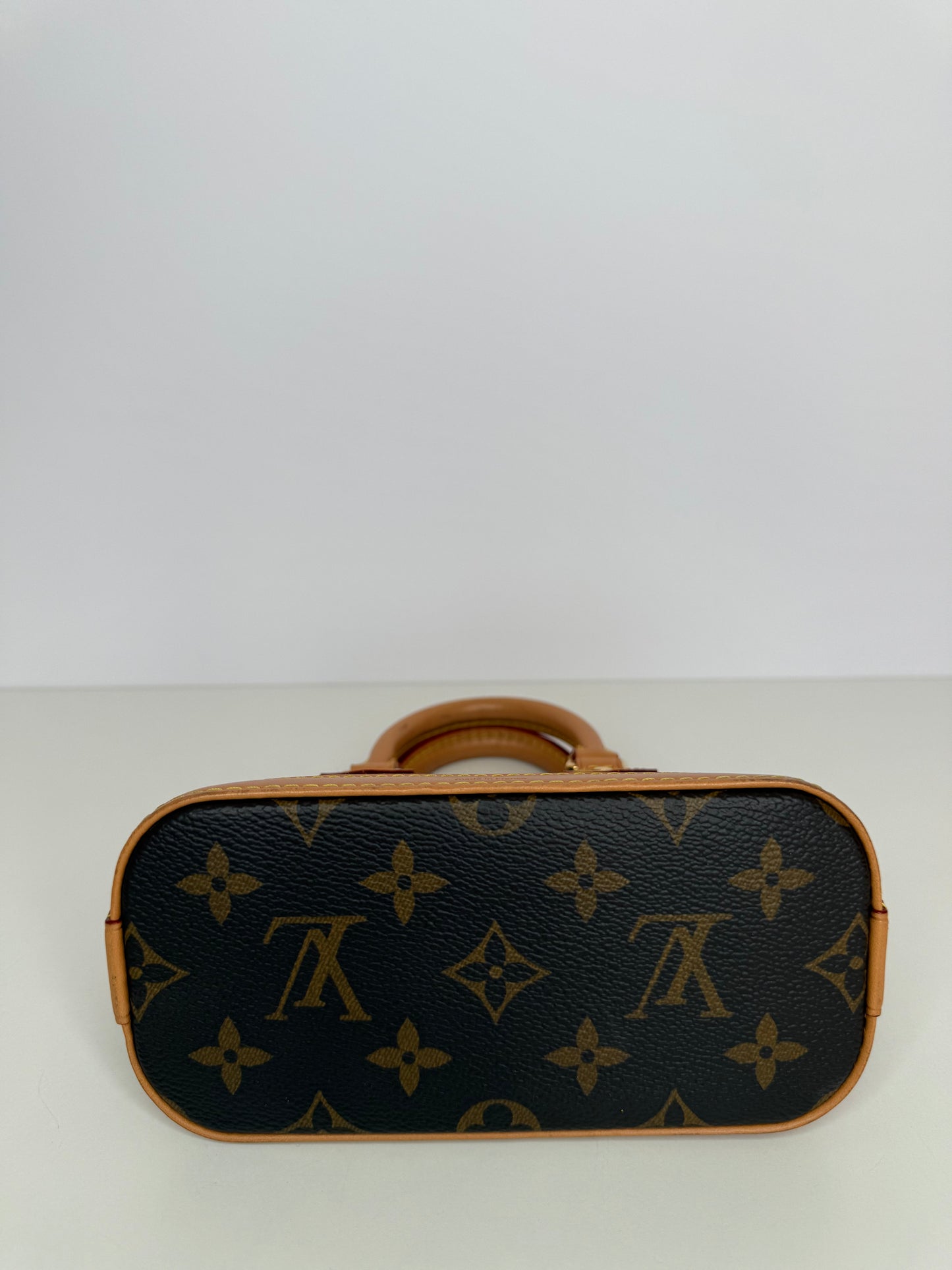 Louis Vuitton Nano Alma Monogram Canvas