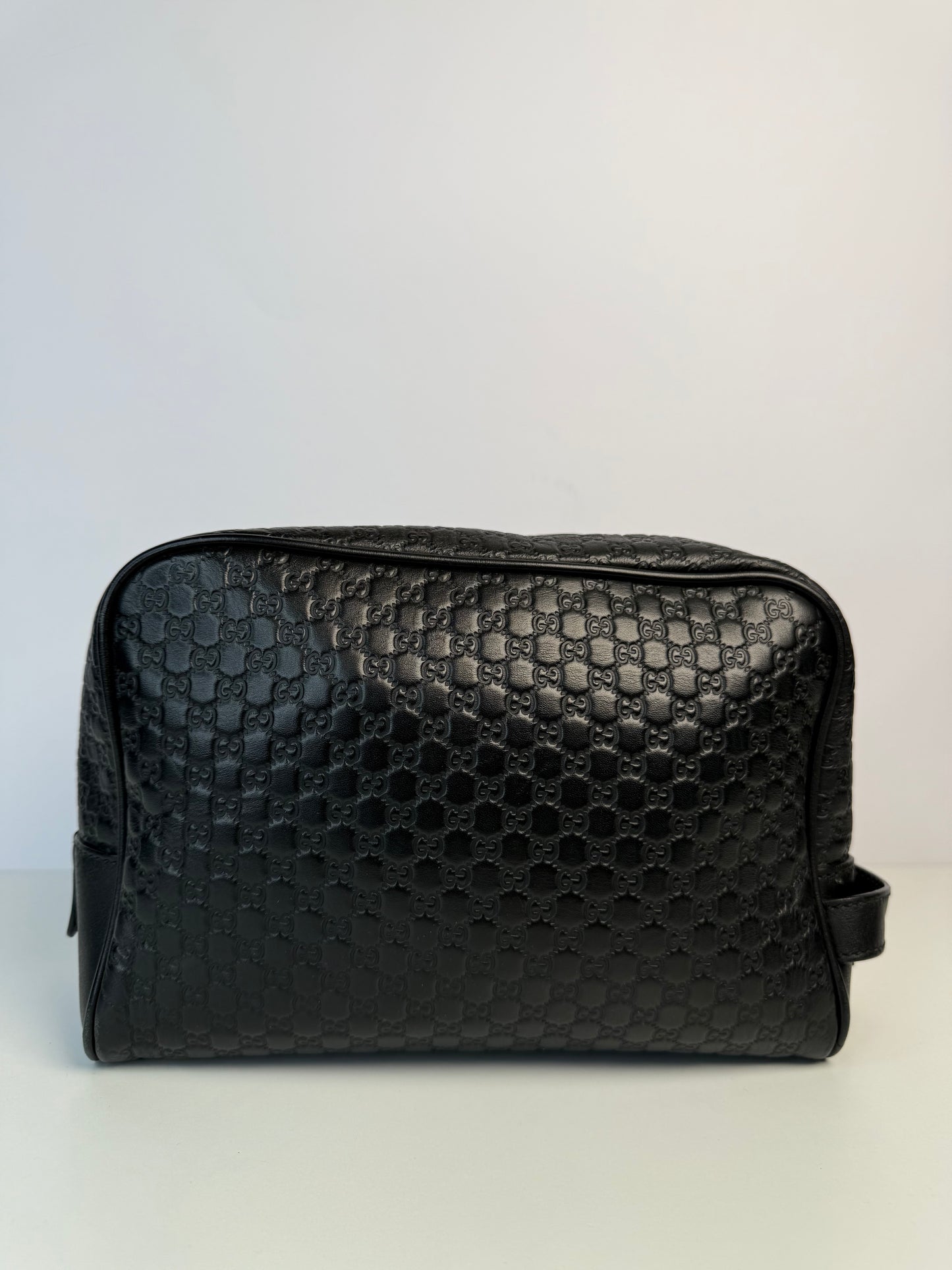 Gucci Men’s Black Microguccissima Toiletry Pouch