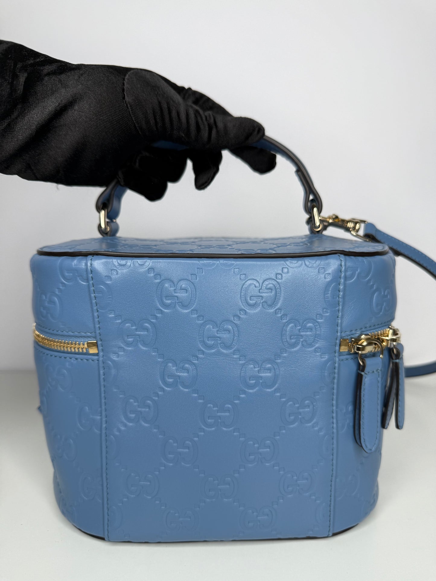 Gucci GG Embossed Beauty Case in Blue Leather