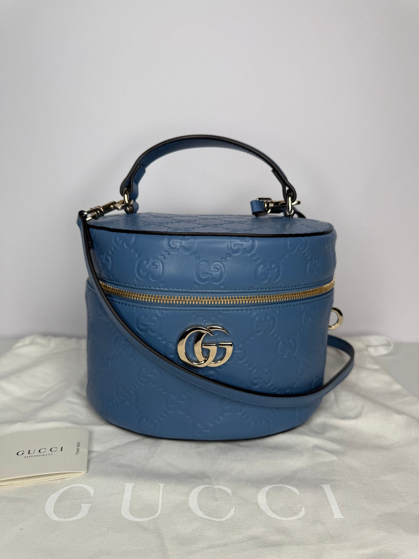 Gucci GG Embossed Beauty Case in Blue Leather