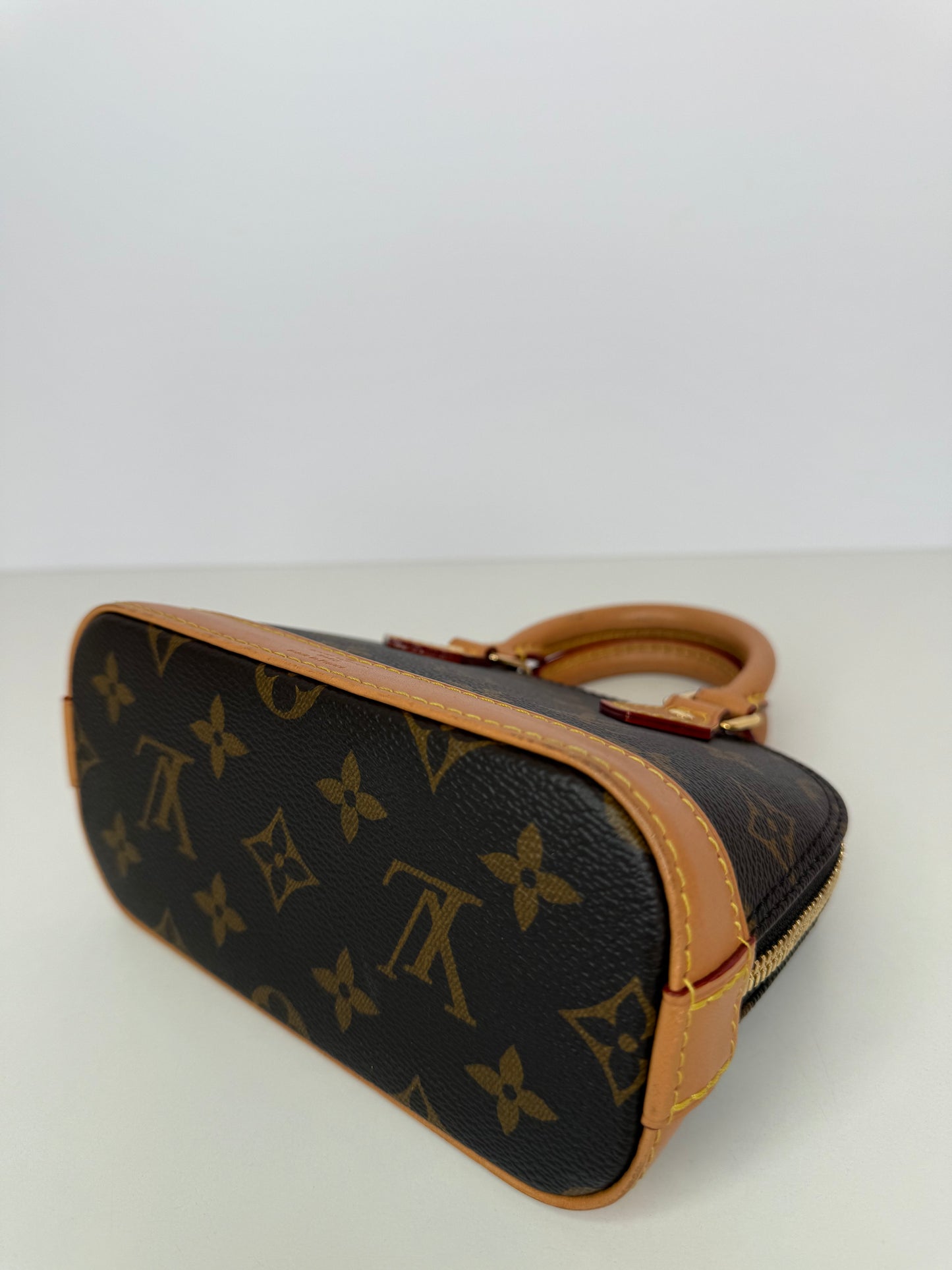 Louis Vuitton Nano Alma Monogram Canvas